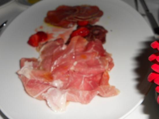 Cinghiale signature dishes Tagliatelle al Ragu BologneseProsciutto di ParmaBraised Wild Boar